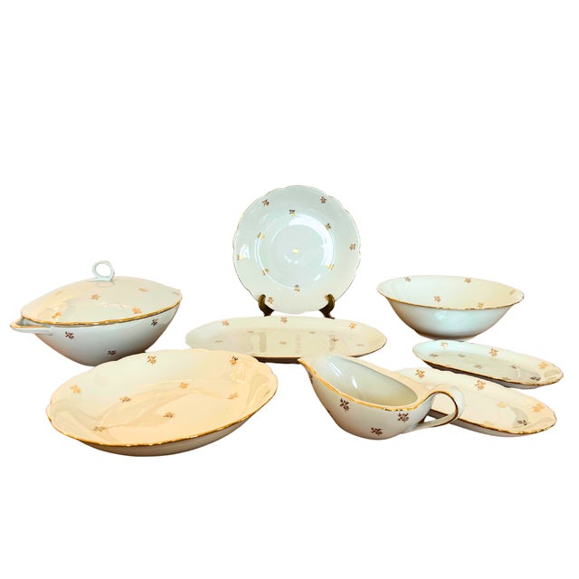 A magnificent, very rare set for 12 people of 31 very elegant plates and service dishes in white Limoges porcelain and...