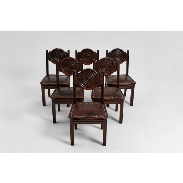 Exceptional set of six French dining chairs designed by Etienne Kohlmann in the 1930s. These chairs stand out for their...