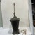 Solid heavy metal/tole faux painted single table lamp features pagoda shape with earthy dark green, hints of rust and...