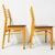 Cool set of 2 vintage Danish design dining room chairs from the sixties with a combination of birch wood with black. The...