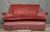 A half-moon shaped toadstool bench, Napoleon III period, upholstered in powder pink velvet. An elegant sofa with rounded...