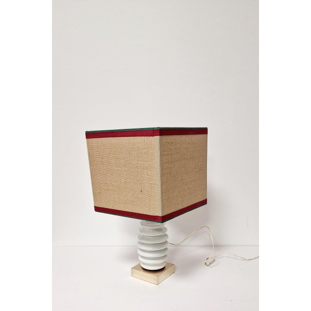 Table lamps from the 60s created with insulators branded Verbano, finished in detail with high quality materials, the...