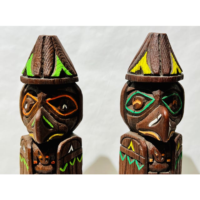 A great pair of vintage totem pole figures featuring the Raven creation myth. Carved from wood and hand painted, this pair...