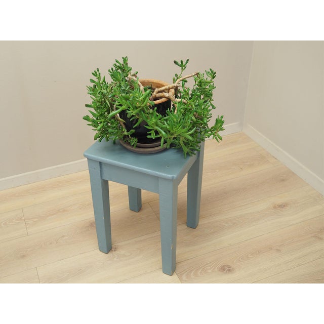 Stool manufactured in the 1950s, Danish production. It was made of solid pine wood. The stool is stained blue using the...