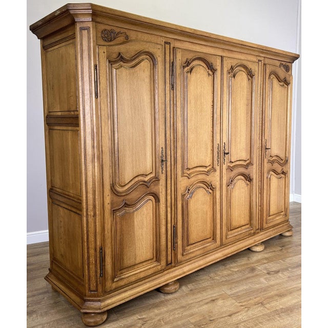 This impressive Vintage French wardrobe offers substantial storage capacity combined with classic French styling....