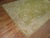 Phenomenal antique Turkish Oushak rug with a warm green field color and pink border. The weave is the best of its kind....