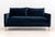 Contemporary Blue Velvet Upholstered Loveseat, on four brass tubular legs. 29" H x 62" W x 37" D; seat: 17.5" H....