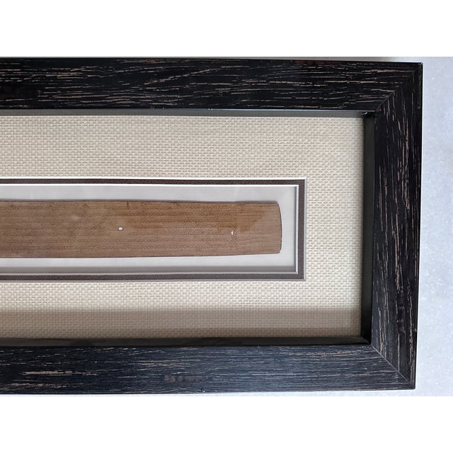 Antique Burmese Buddhist Scripture on Palm Leaf. Acquired in Myanmar in 1996. Professionally framed in Colorado on 2006....