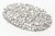 This lovely tray is an open weave design that resembles coral in nickel plated solid brass. It was designed by Donna Karan...