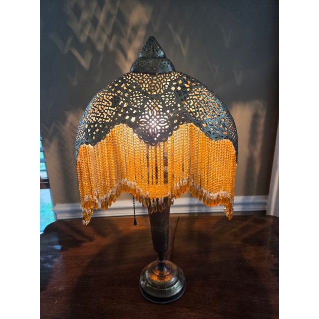 Moorish Revival brass table lamp with pierced filigree brass stand and Persian style shade. Trimmed with 5 inch vintage...