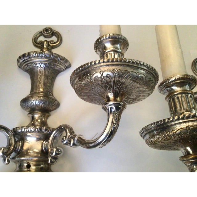 Exquisite pair of silvered bronze sconces were custom-made for a Gilded Age mansion on Park Avenue in New York. Stamped by...