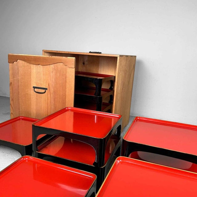 A beautiful set of ten Japanese wooden serving tables from the Taishō period, complete with original wooden storage box....