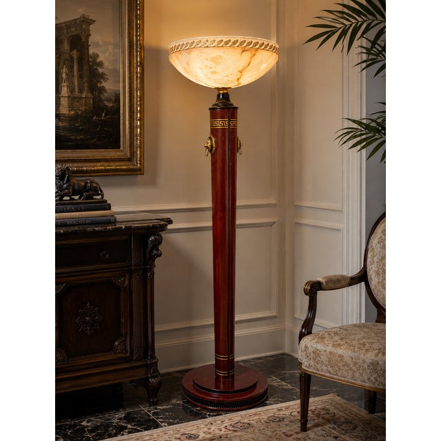 A spectacular Empire floor lamp by Infinity Furniture Import, combining monumental scale with richly executed Neoclassical...