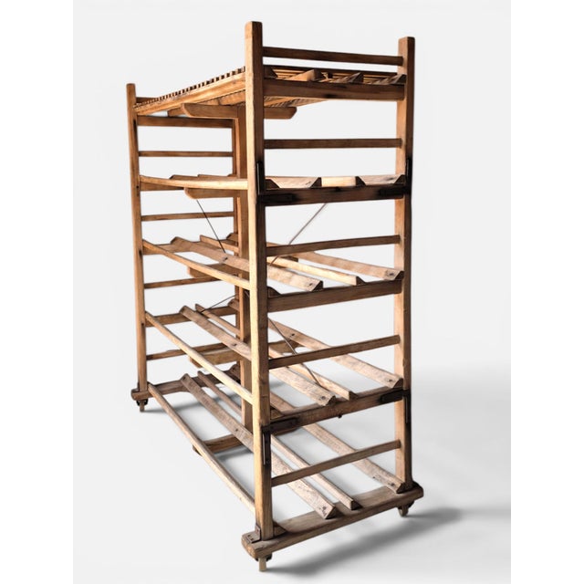 A wonderful French industrial baking rack on original wheels circa 1940s. The open shelves once cooled and displayed...