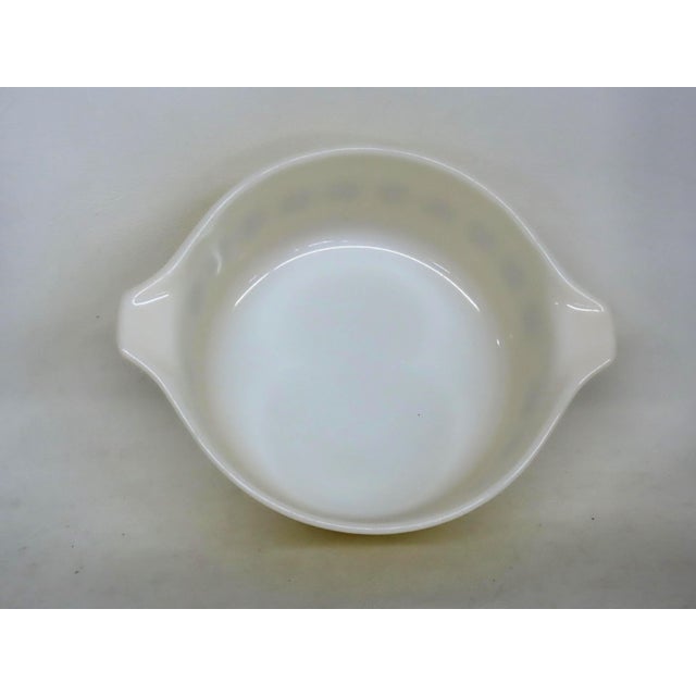 This wonderful Bowl Casserole Dish is made out of glass. This bowl was made by Pyrex, in the cross stitch star patten, and...