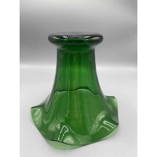 Beautiful vintage emerald green art glass vase featuring a dramatic flared trumpet form with a wide, hand-shaped ruffled...