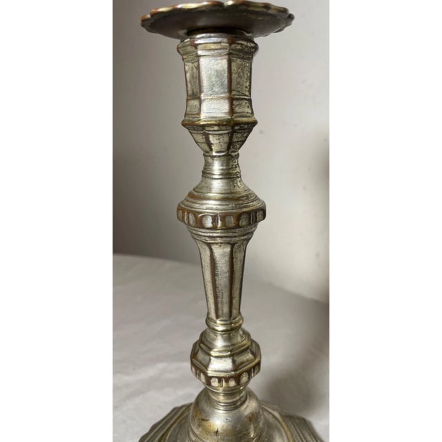 Elevate your space with the elegance of the 18th century with this fine pair of Louis XIV French silvered bronze...