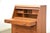 A mid century modern teak secretary desk with a slide up top as you open there first drawer made by Dyrlund. Made in...