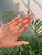 This elegant pear cut emerald and diamond Toi et Moi bypass ring is crafted in 14K white gold. The emerald measures...