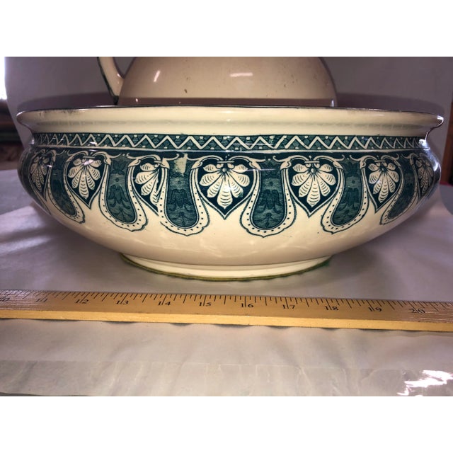 A fabulous French ceramic wash bowl and pitcher from Sarregumines, France. Signed under side Lierre U&C. This is truly a...