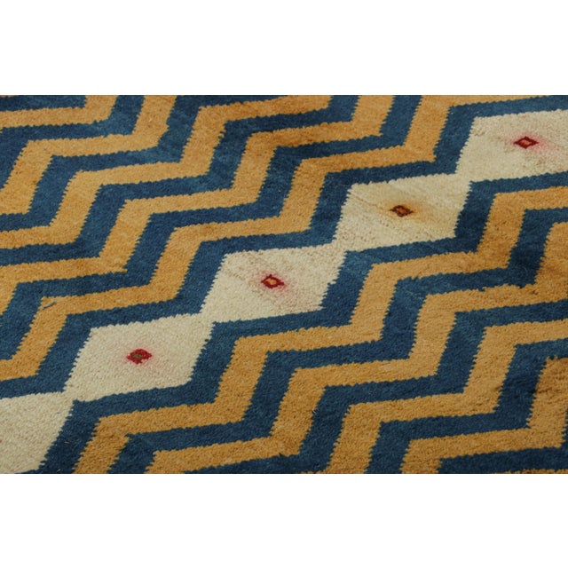Made with hand-knotted wool, this 3x4 vintage Persian Gabbeh rug originating circa 1950-1960, is a bold new addition to...