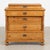19th century Danish chest of four drawers, crafted in pine with a warm wax finish that enhances the natural aged patina of...