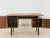 Very nice freestanding teak desk from the 1960s. The elegant wood grain gives the room a special charisma, while the...