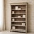 Handsome in form and practical in design, this antique Dutch open bookcase was crafted during the early 1900s from solid...