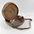 An Ethiopian leather-covered bread basket with a gorgeous patina. Baskets such as this are found among the Oromo and other...