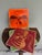 A striking collection of square glazed ceramic tiles bearing the artist's stamp on the reverse acquired directly from an...