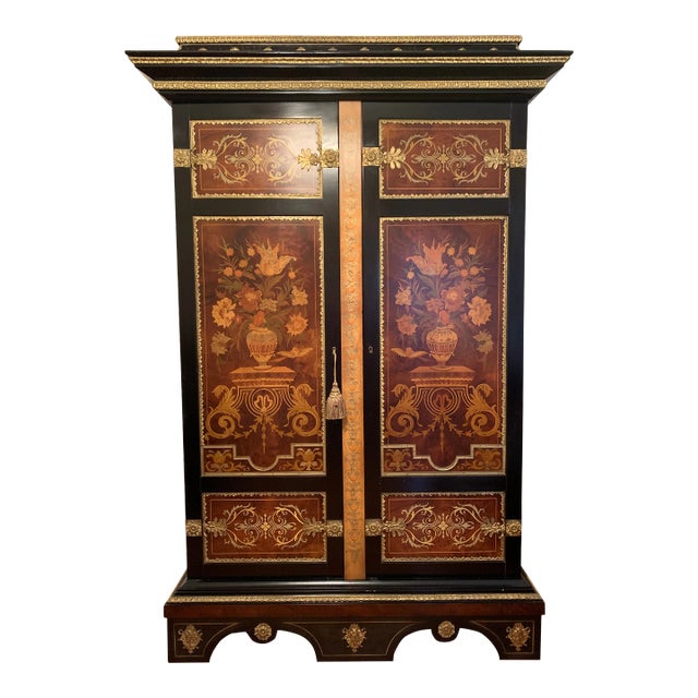 Mid 20th Century Spanish Armoire Featuring Fine Marquetry Panels and Brass Accents. For Sale