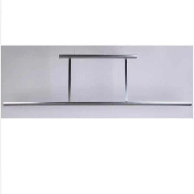 Very large aluminum pendant light circa 1970. Very good condition. Note a few tiny scratches. Works perfectly. I have...