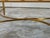 Metal Italian Midcentury Gilt Bronze Coffee Table with Glass Top and Ring Motifs For Sale - Image 7 of 11