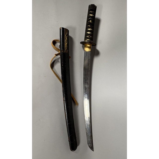JAPAN, 17th-18th century. Katana with a shinogi-zukuri blade, gunome hamon, nakago with a mekugi-ana, signed Mikawa (no)...