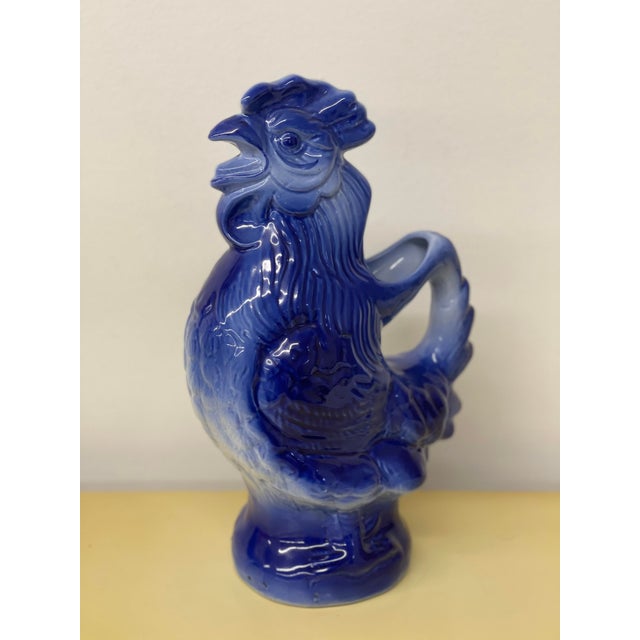 Beautiful Vintage Ceramic Glazed Rooster Pitcher in Blue. Lovely piece in excellent vintage condition. Measures 12.25”...