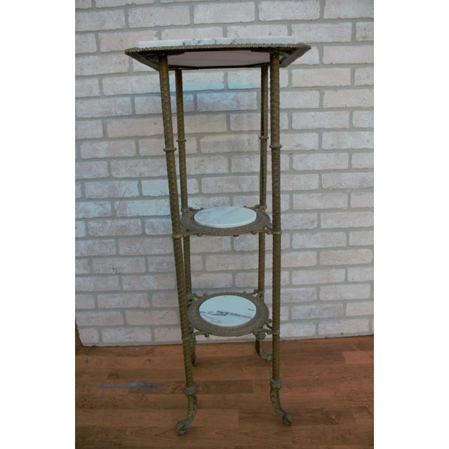 Antique Victorian Style Three Tier Brass with Marble Insert Etagere Pedestal Stand Table Has a square marble on top shelf...