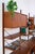 This wall shelf by Poul Cadovius combines ample storage space with an open and pleasantly light design. The warm wood...
