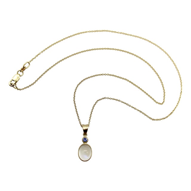 1990s 14k Gold Moonstone Cabochon and Sapphire Pendant Necklace For Sale