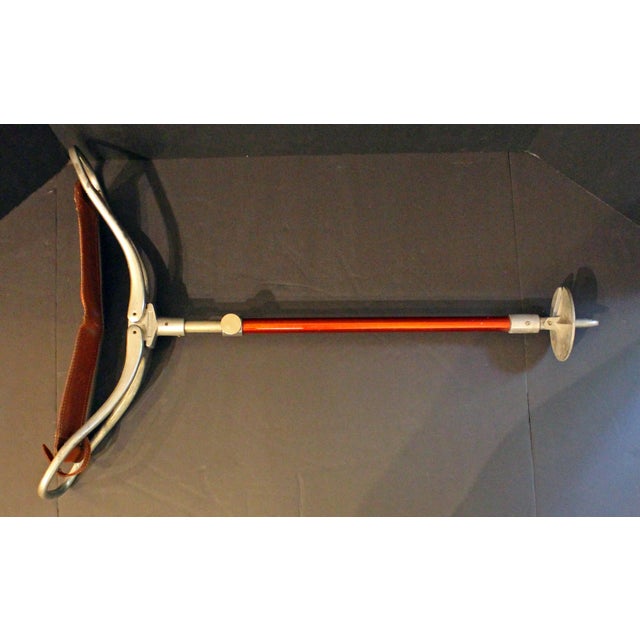 Mid-20th century English adjustable height shooting stick. For hunting or sporting events with fold out seat & disc which...