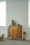 An elegant mid 20th century Danish oak drop‑front secretary desk / bureau featuring a classic fall‑front writing surface...