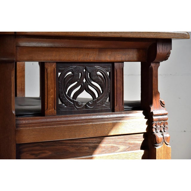 Stunning and one of a kind Lion Cachet attributed Art Deco armchair. This work of art is made of oak and Jatoba beautiful...