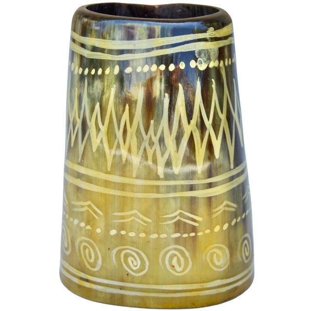 Fabulous vintage West-African catchall, thoughtfully handmade in an ornate silhouette with natural horn hues. Exhibiting...