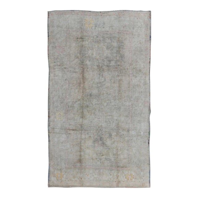 Muted Vintage Turkish Oushak Rug With Central Medallion in Gray, Ivory, Brown For Sale