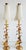 Pair of Chelsea House Rosetti metal buffet lamps in an antique gold finish, with leaf motif and crystal prisms. Chelsea...