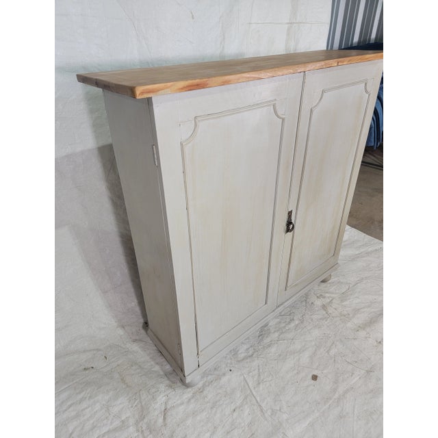 Antique Painted 2 Door Cupboard With Natural Top From England. We found this cupboard in northeastern England.. The size...
