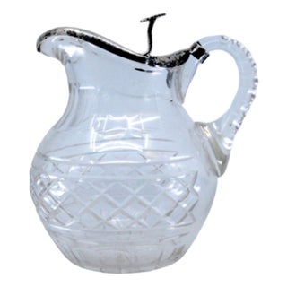 Wine Jug in Cut Glass with Silver Lid and Raised Floral Motifs For Sale