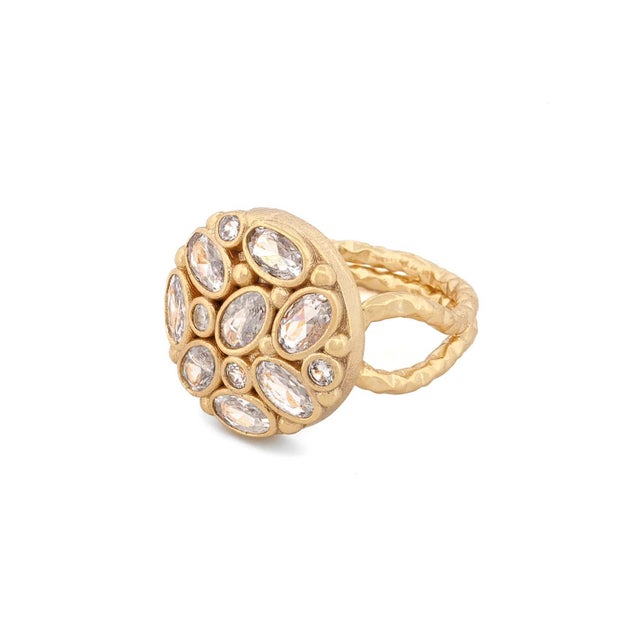 The Radiant Cluster Swarovski Crystal Gold Adjustable Ring is designed to make a dazzling statement with its sparkling...