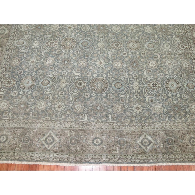 Antique Persian Tabriz rug in silver, green blue and brown hues. Measures: 9' x 12'8''.