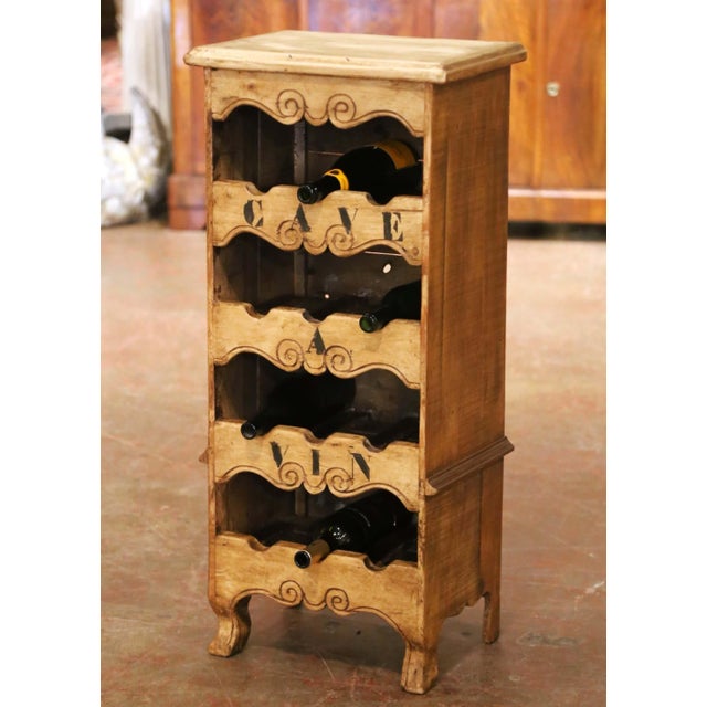 This charming vintage wine cabinet was handcrafted in the Poitou region of France using reclaimed pine, reflecting the...