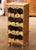 This charming vintage wine cabinet was handcrafted in the Poitou region of France using reclaimed pine, reflecting the...